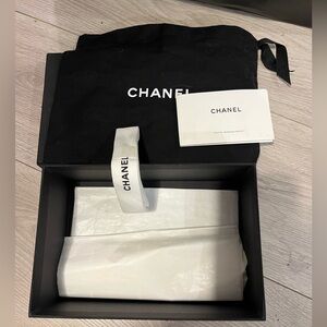 Chanel box, ribbon, and flower